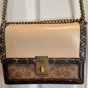 Hutton Coach Logo Cream and Brown Chain Crossbody Clutch Bag.